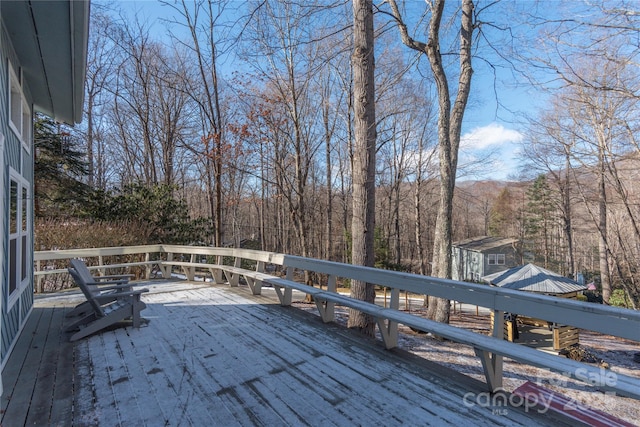 wooden terrace with a mountain view