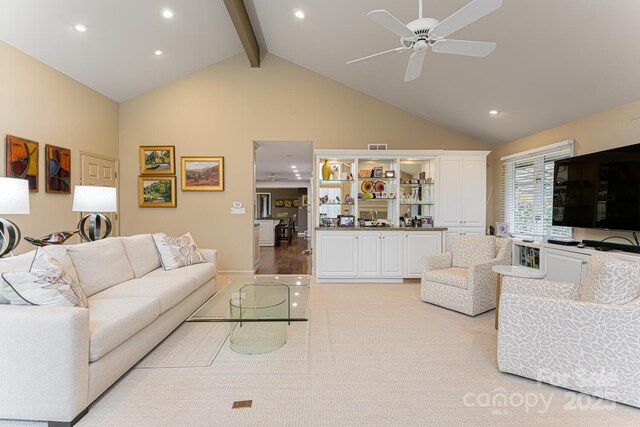 living room with beamed ceiling, recessed lighting, high vaulted ceiling, and ceiling fan