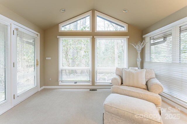 sitting room featuring baseboards, carpet flooring, recessed lighting, and lofted ceiling