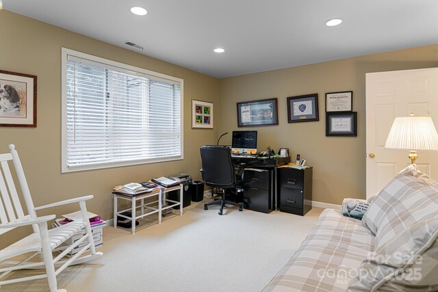 office space with carpet floors, recessed lighting, baseboards, and visible vents