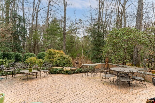 view of patio with outdoor dining area