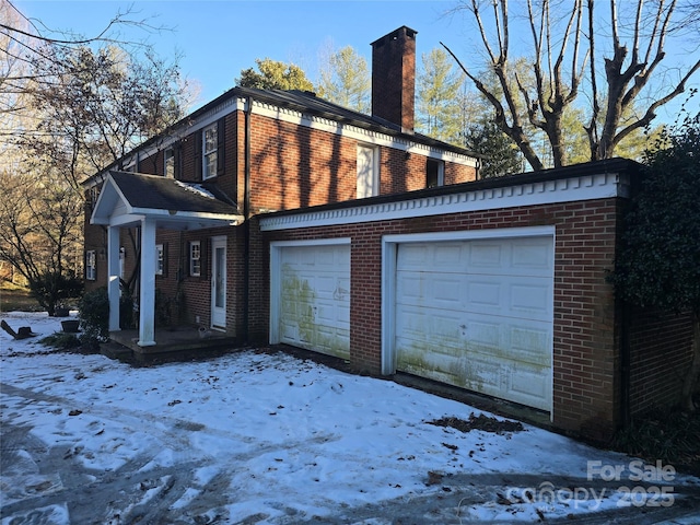 exterior space featuring a garage