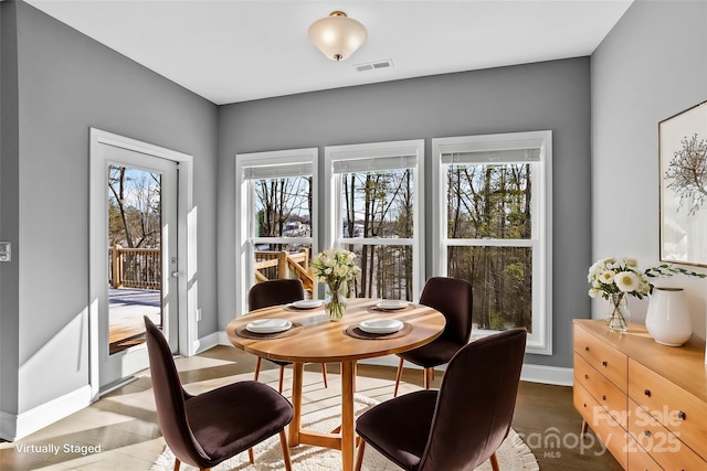 dining room featuring hardwood / wood-style flooring