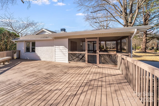 deck with a sunroom