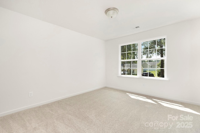 view of carpeted spare room