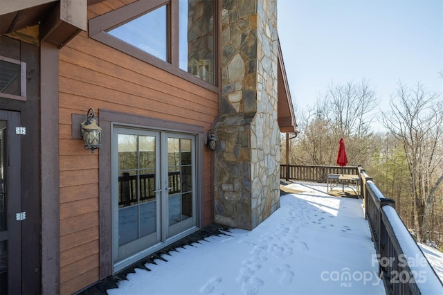 view of snow covered property