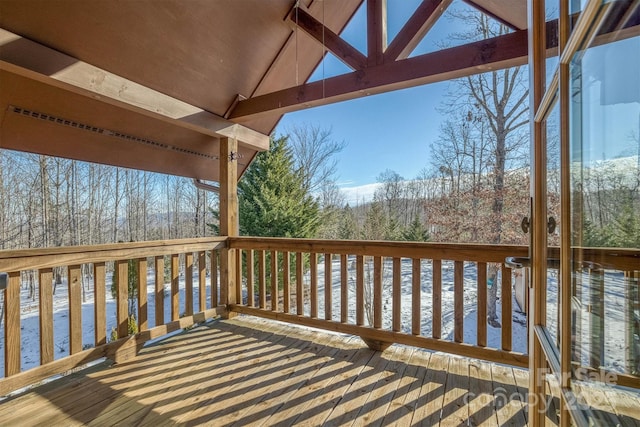 view of snow covered deck