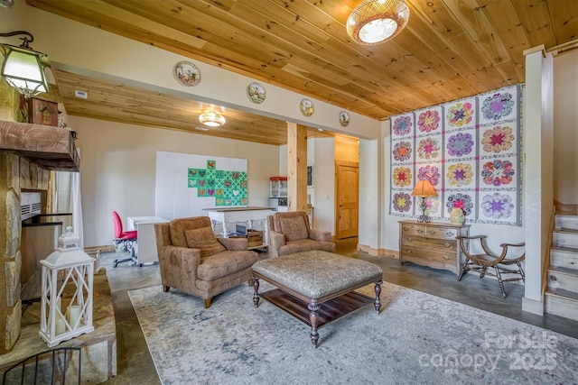 living room with a fireplace and wood ceiling