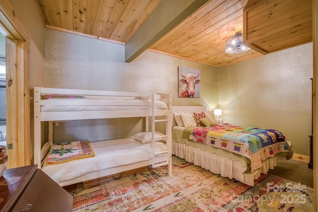 bedroom with wooden ceiling and crown molding