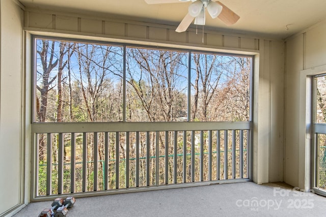 unfurnished sunroom featuring a wealth of natural light