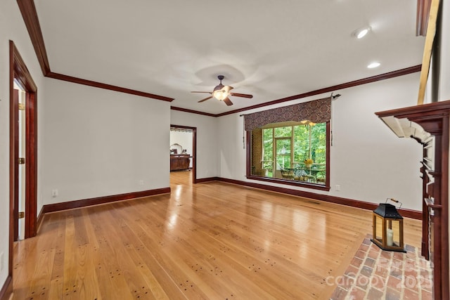 unfurnished living room with crown molding, hardwood / wood-style flooring, and ceiling fan