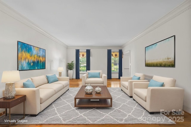 living room with hardwood / wood-style flooring and ornamental molding