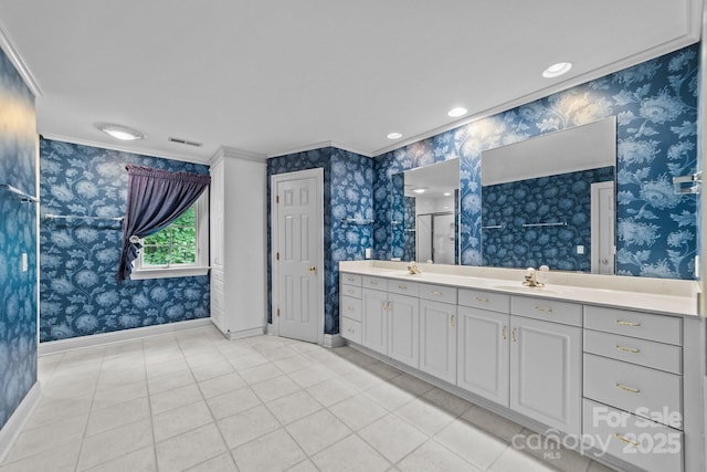 bathroom with vanity, a shower, ornamental molding, and tile patterned flooring