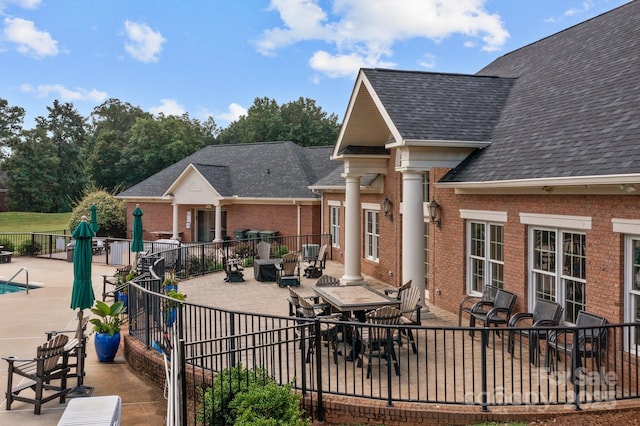 rear view of property with a patio area