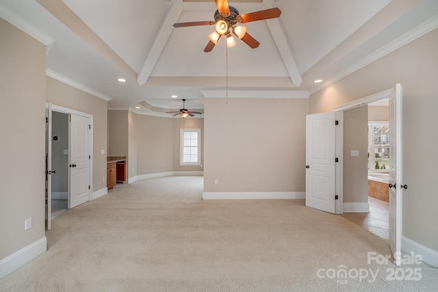 carpeted empty room featuring beam ceiling, ornamental molding, and high vaulted ceiling