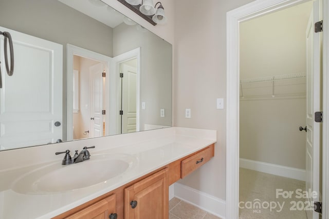 bathroom featuring vanity and tile patterned floors