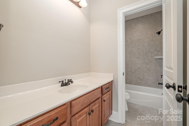 full bathroom with vanity, toilet, tiled shower / bath combo, and tile patterned flooring