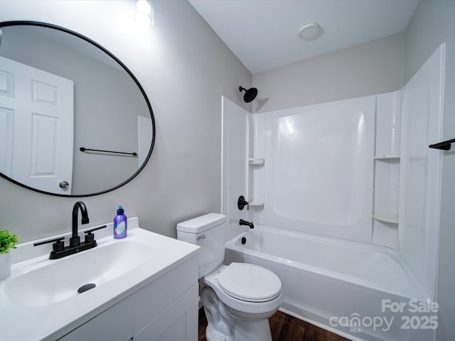 full bathroom with wood-type flooring, bathtub / shower combination, vanity, and toilet