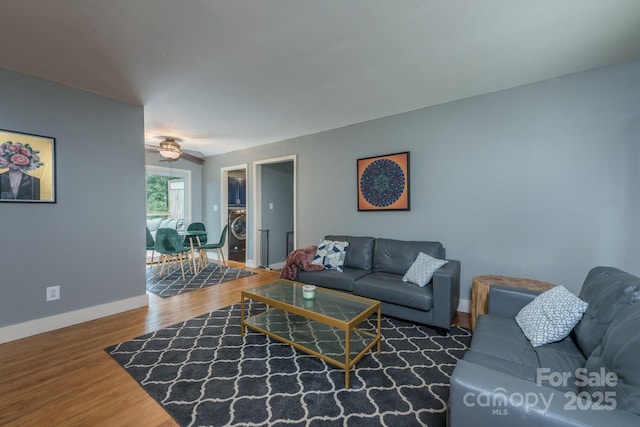 living room featuring dark wood-type flooring