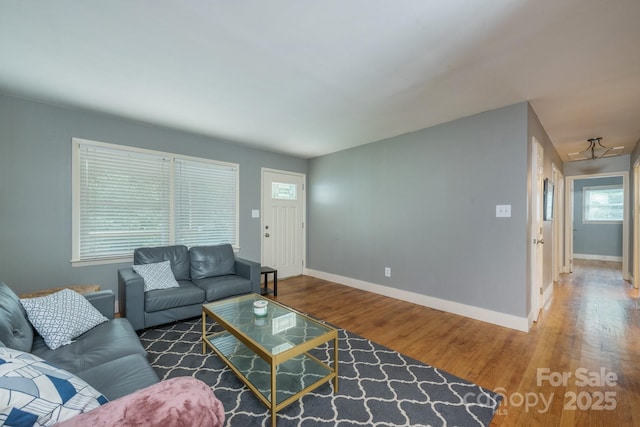 living room with dark wood-type flooring