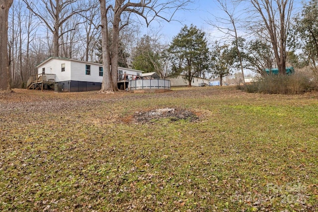 view of yard featuring a deck