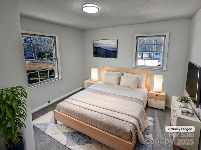 bedroom featuring a textured ceiling