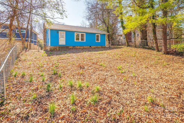 exterior space featuring a fenced backyard