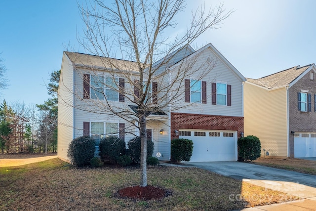 front of property with a garage