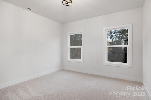 view of carpeted spare room