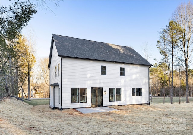 rear view of house featuring a patio area