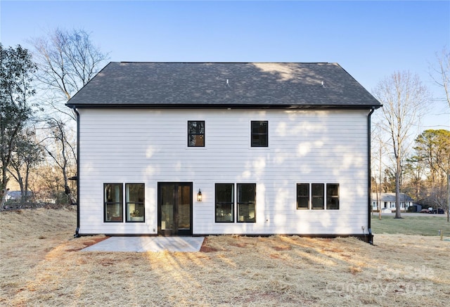 rear view of property with a patio area