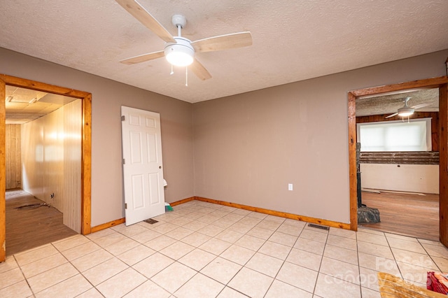 unfurnished bedroom featuring a textured ceiling, a closet, and ceiling fan