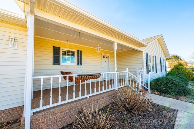 entrance to property with a porch