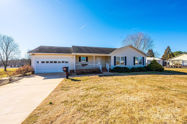 single story home featuring a porch, a garage, and a front lawn