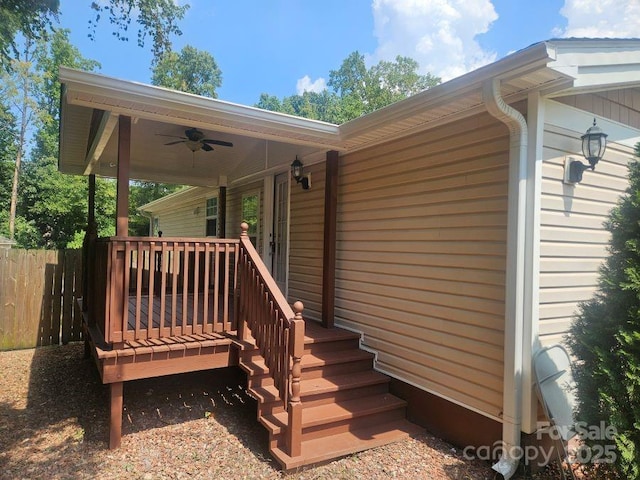 exterior space featuring ceiling fan