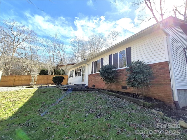 exterior space featuring entry steps and fence