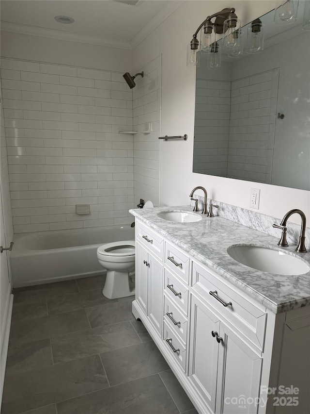 full bathroom featuring toilet, tiled shower / bath combo, tile patterned flooring, crown molding, and vanity