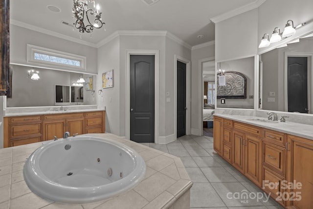 bathroom featuring crown molding, vanity, and an inviting chandelier