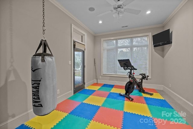 exercise room with baseboards, recessed lighting, visible vents, and crown molding