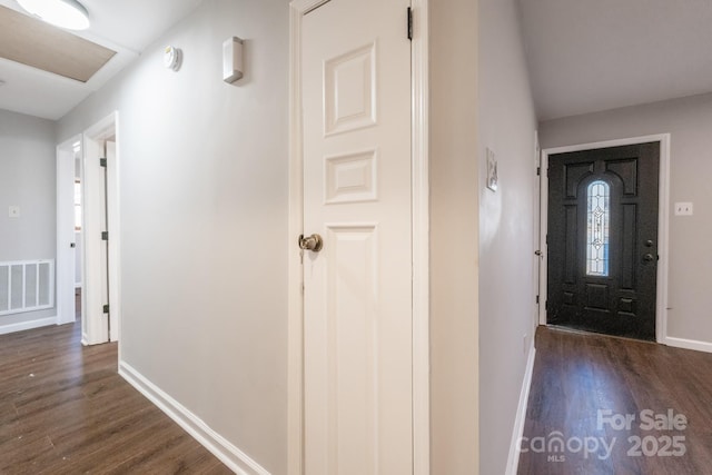 entrance foyer with dark hardwood / wood-style flooring