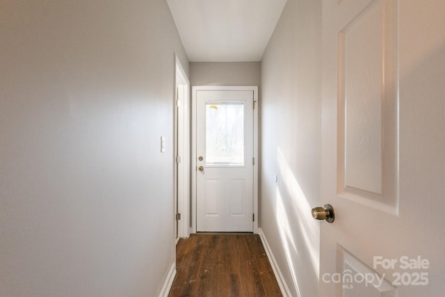 entryway with dark hardwood / wood-style floors