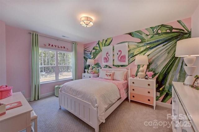 bedroom featuring light carpet, visible vents, and baseboards