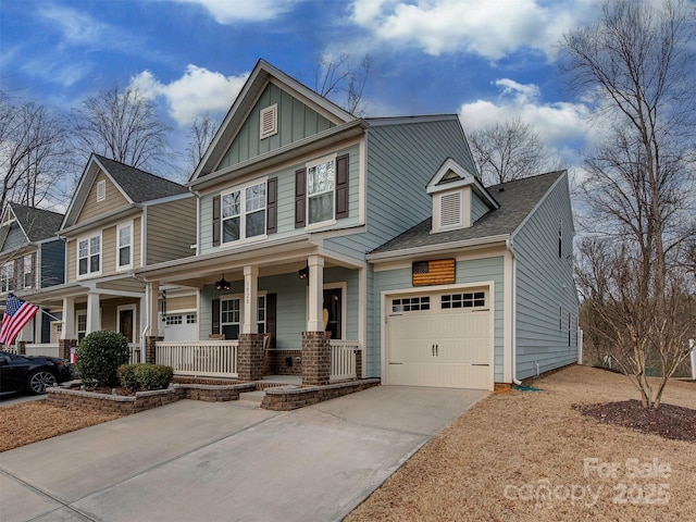 view of front of property featuring a garage and covered porch