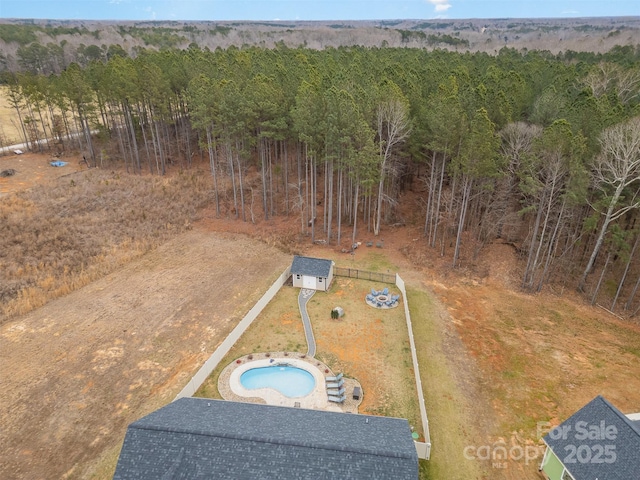 aerial view featuring a forest view