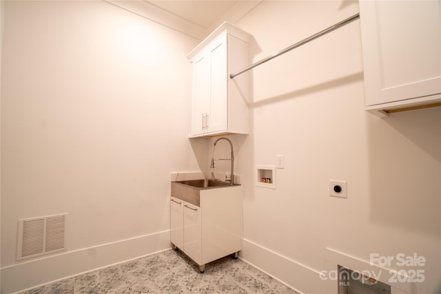 laundry room featuring hookup for an electric dryer, washer hookup, cabinets, ornamental molding, and sink