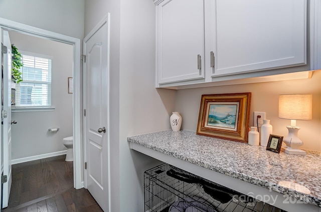 interior space with hardwood / wood-style flooring