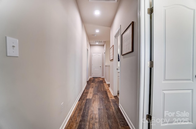 hall with dark wood-type flooring