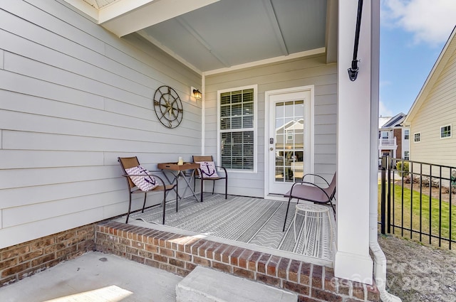 wooden deck featuring covered porch