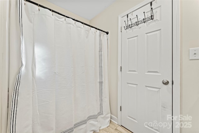 bathroom featuring hardwood / wood-style flooring