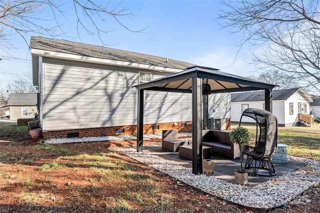 exterior space featuring a gazebo and a patio